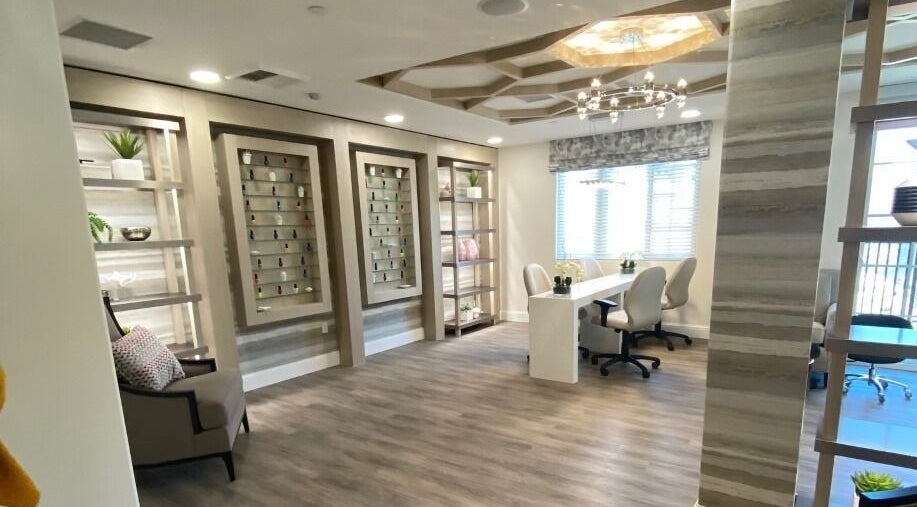 Chic interior of ACOYA Troon Spa Sensi Salon in Scottsdale, Arizona with modern decor and sleek seating.