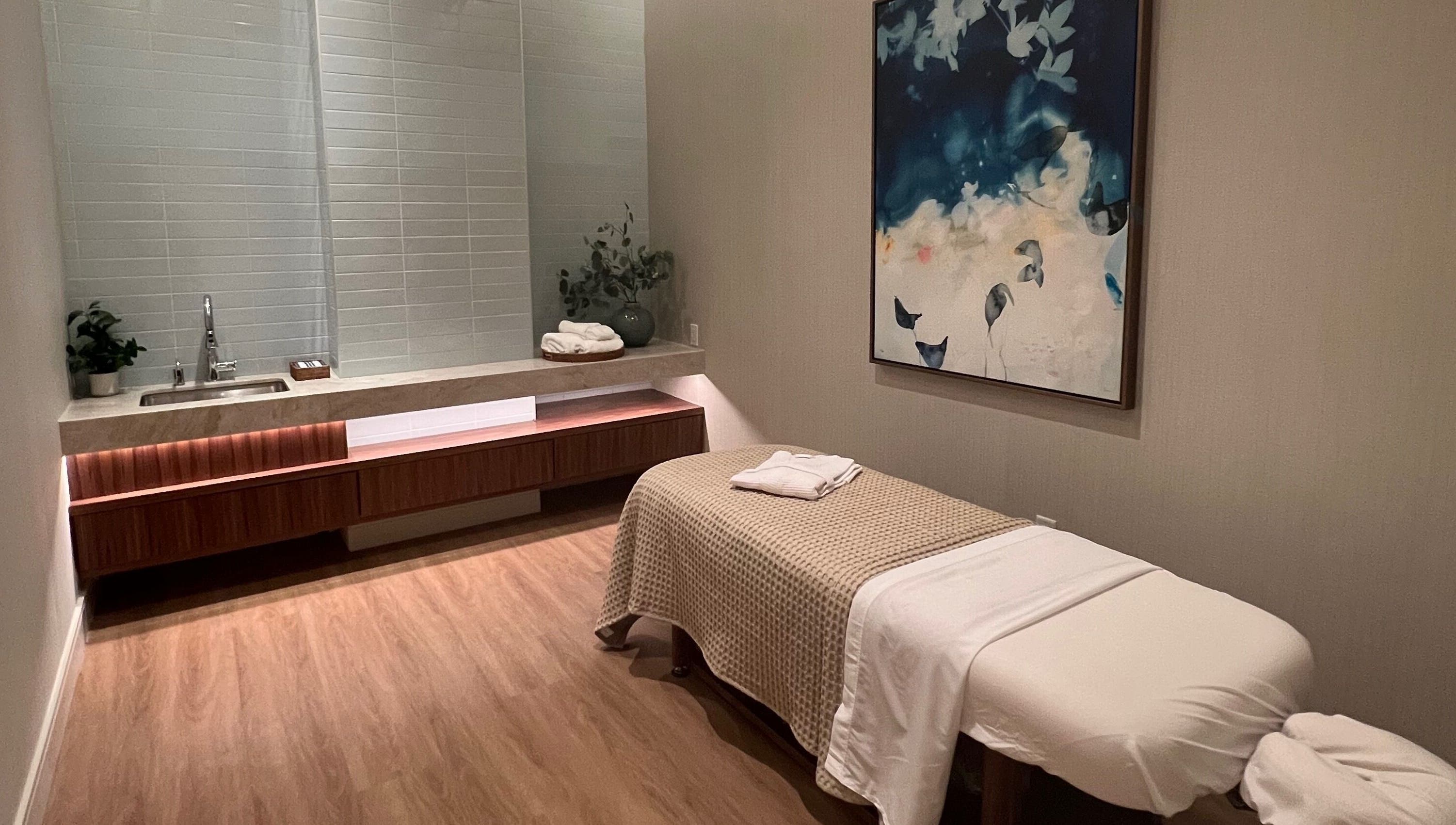 Elegant massage room at Indulge at Clearwater at the Heights, Houston, Texas, US, featuring calming decor.