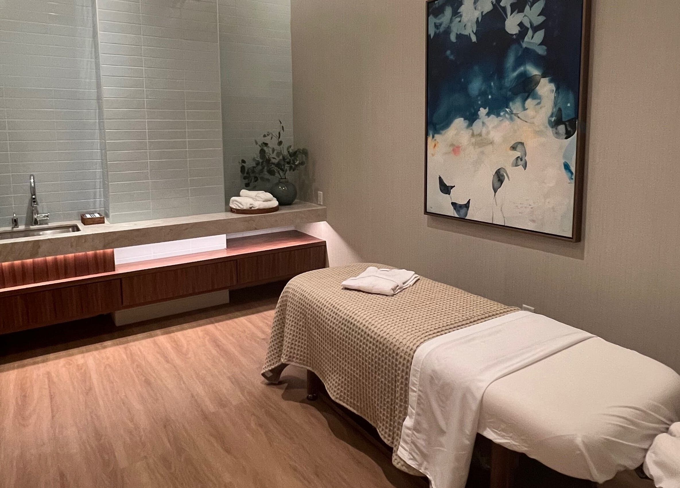 Elegant massage room at Indulge at Clearwater at the Heights, Houston, Texas, US, featuring calming decor.
