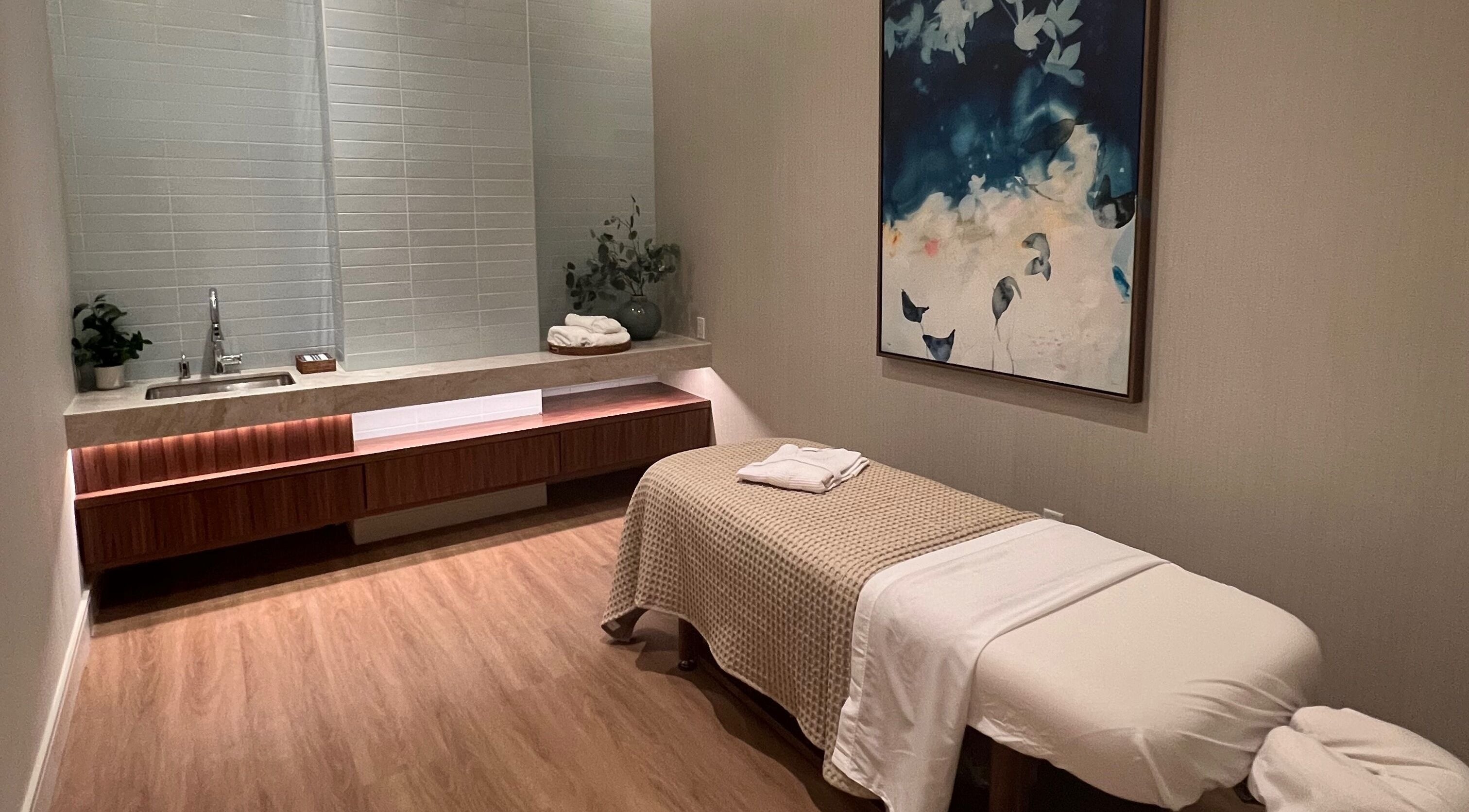 Elegant massage room at Indulge at Clearwater at the Heights, Houston, Texas, US, featuring calming decor.
