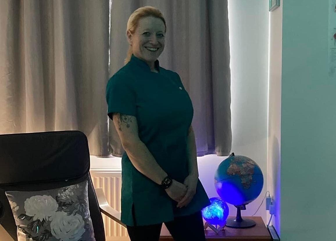 Massage therapist at 'Me Time!' Massage And Well Being, Weston-super-Mare, England, GB, in a serene room.