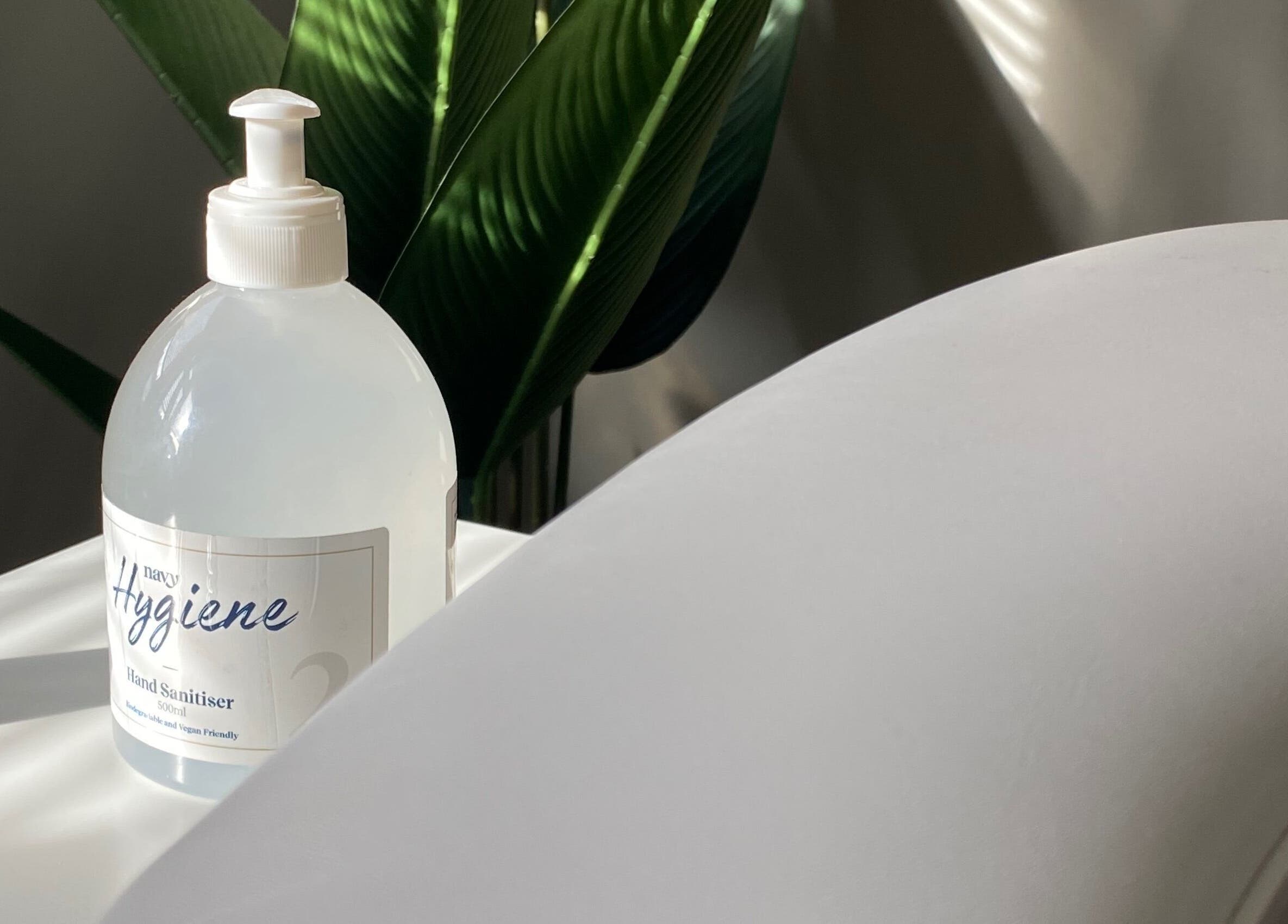 Hand sanitizer bottle on table at Beauty By Rosy in Gedling, England, GB, highlighting hygiene focus.