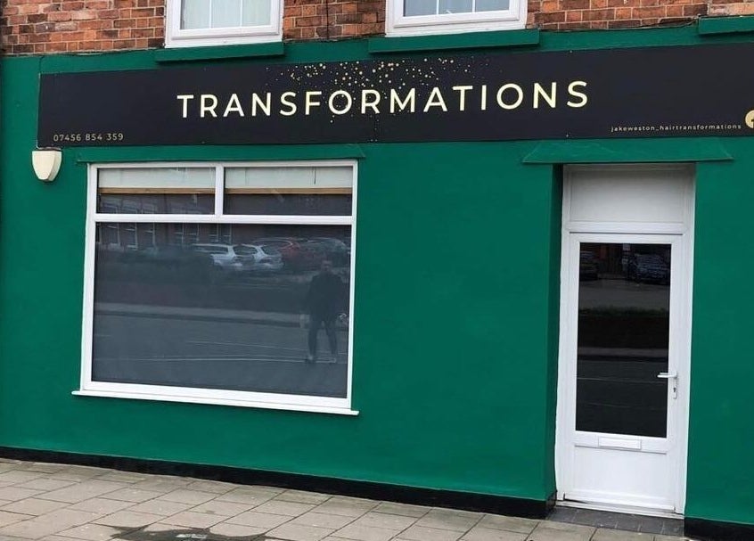 Front view of Jake Weston Hair Transformations in Grantham, England, GB, featuring a sleek green exterior.