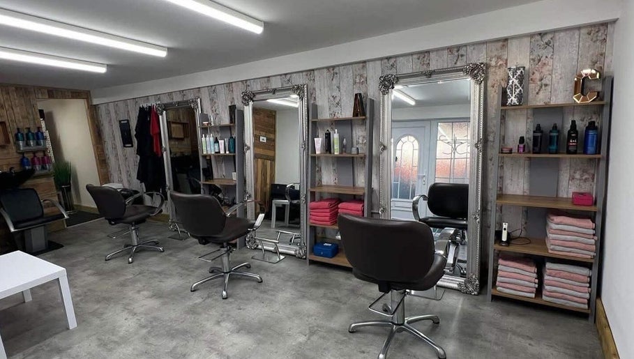 Elegant salon interior at LavenderBlue HQ in Herne Bay, England, GB with stylish chairs and mirrors.