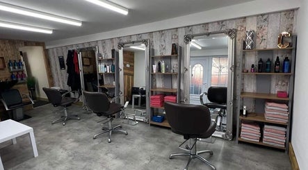 Elegant salon interior at LavenderBlue HQ in Herne Bay, England, GB with stylish chairs and mirrors.