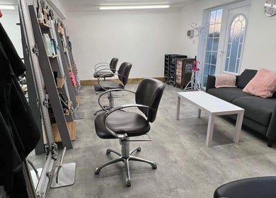 Modern salon chairs and cozy couch at LavenderBlue HQ in Herne Bay, England, GB offer a relaxing atmosphere.