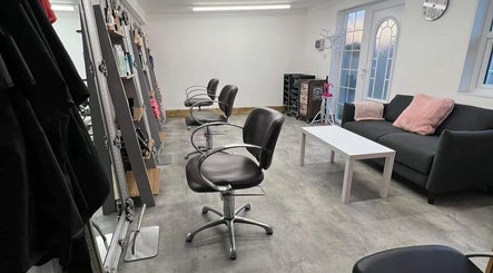 Modern salon chairs and cozy couch at LavenderBlue HQ in Herne Bay, England, GB offer a relaxing atmosphere.