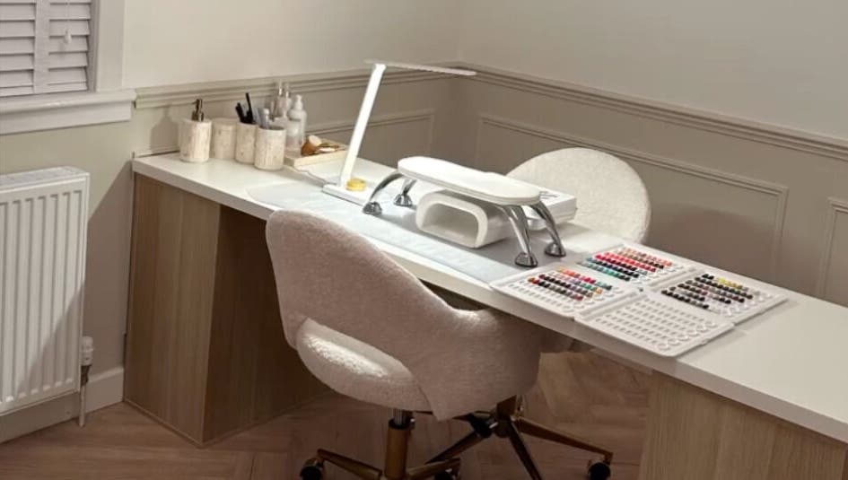 Nail station at Nimmos Nails and Beauty, Whitburn, Scotland, GB featuring organized tools and nail polishes.