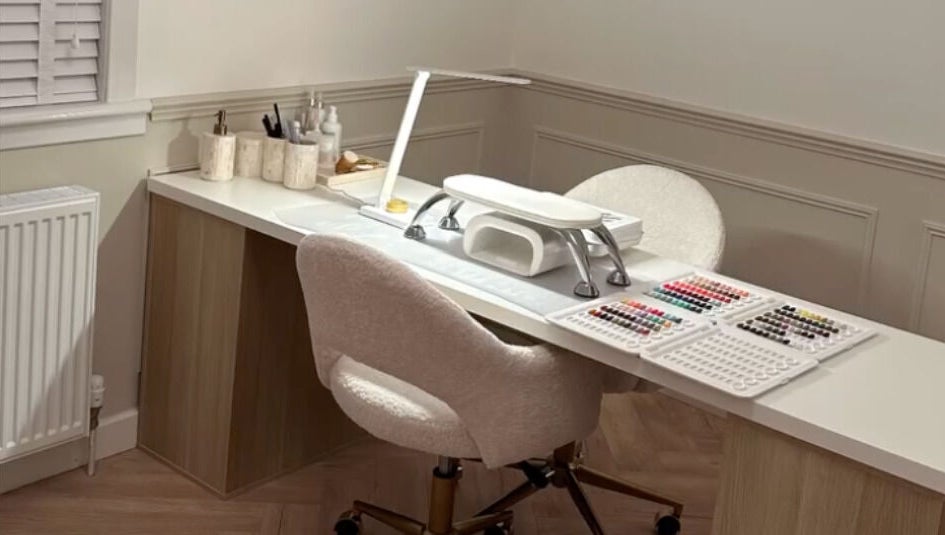 Nail station at Nimmos Nails and Beauty, Whitburn, Scotland, GB featuring organized tools and nail polishes.