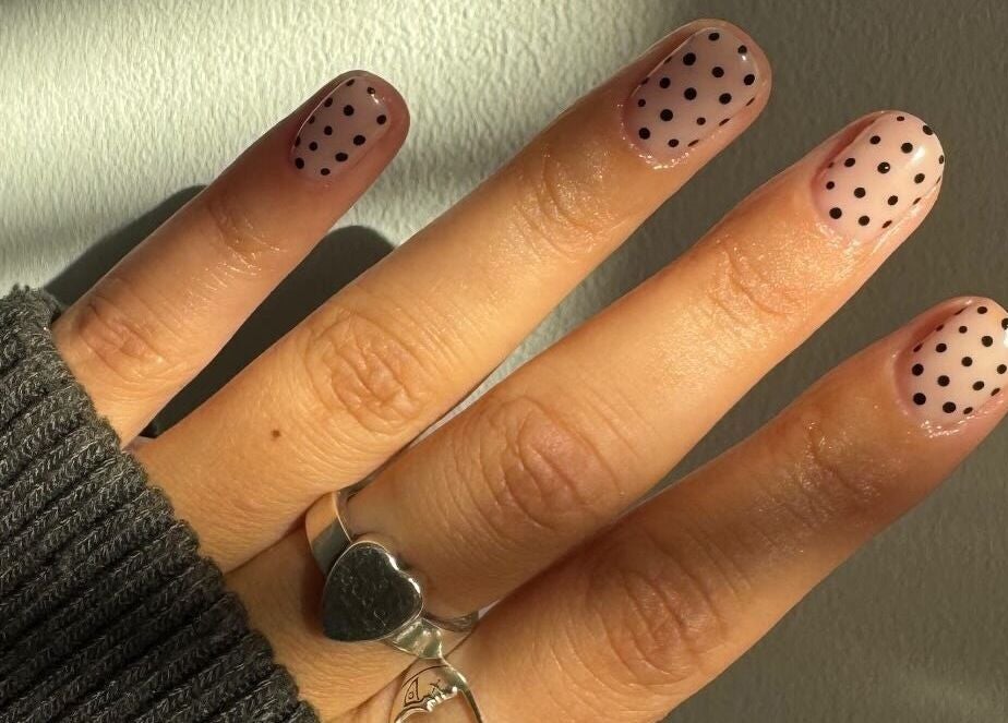 Stylish polka dot nail art at Nimmos Nails and Beauty in Whitburn, Scotland, GB.