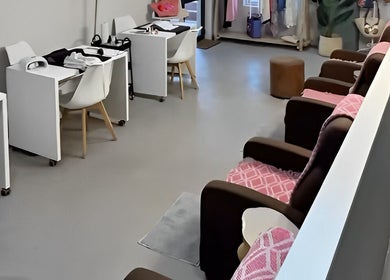 Modern salon interior at Permalicious Ink, Beauty and Aesthetics, Sandton, Gauteng, ZA with chic nail stations.