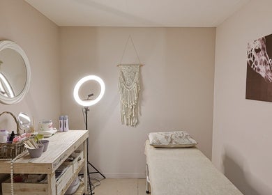 Peaceful treatment room at Permalicious Ink, Beauty and Aesthetics, Sandton, Gauteng, ZA with soft lighting.