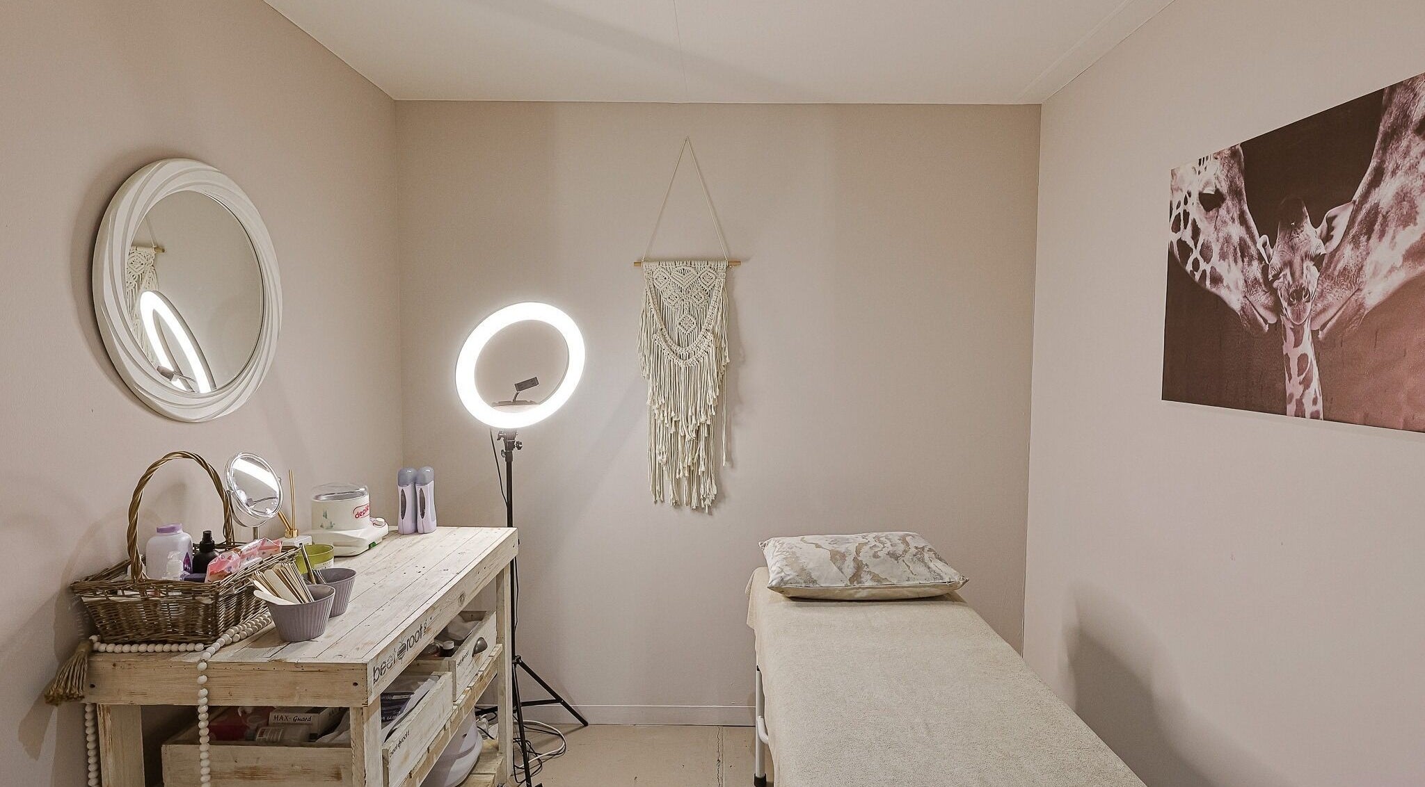 Peaceful treatment room at Permalicious Ink, Beauty and Aesthetics, Sandton, Gauteng, ZA with soft lighting.