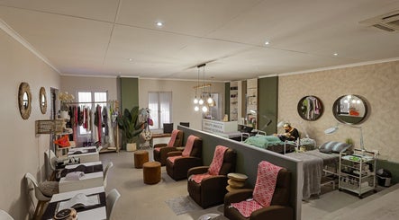 Elegant Permalicious Ink, Beauty and Aesthetics studio in Sandton, Gauteng, ZA, showing manicure stations and decor.