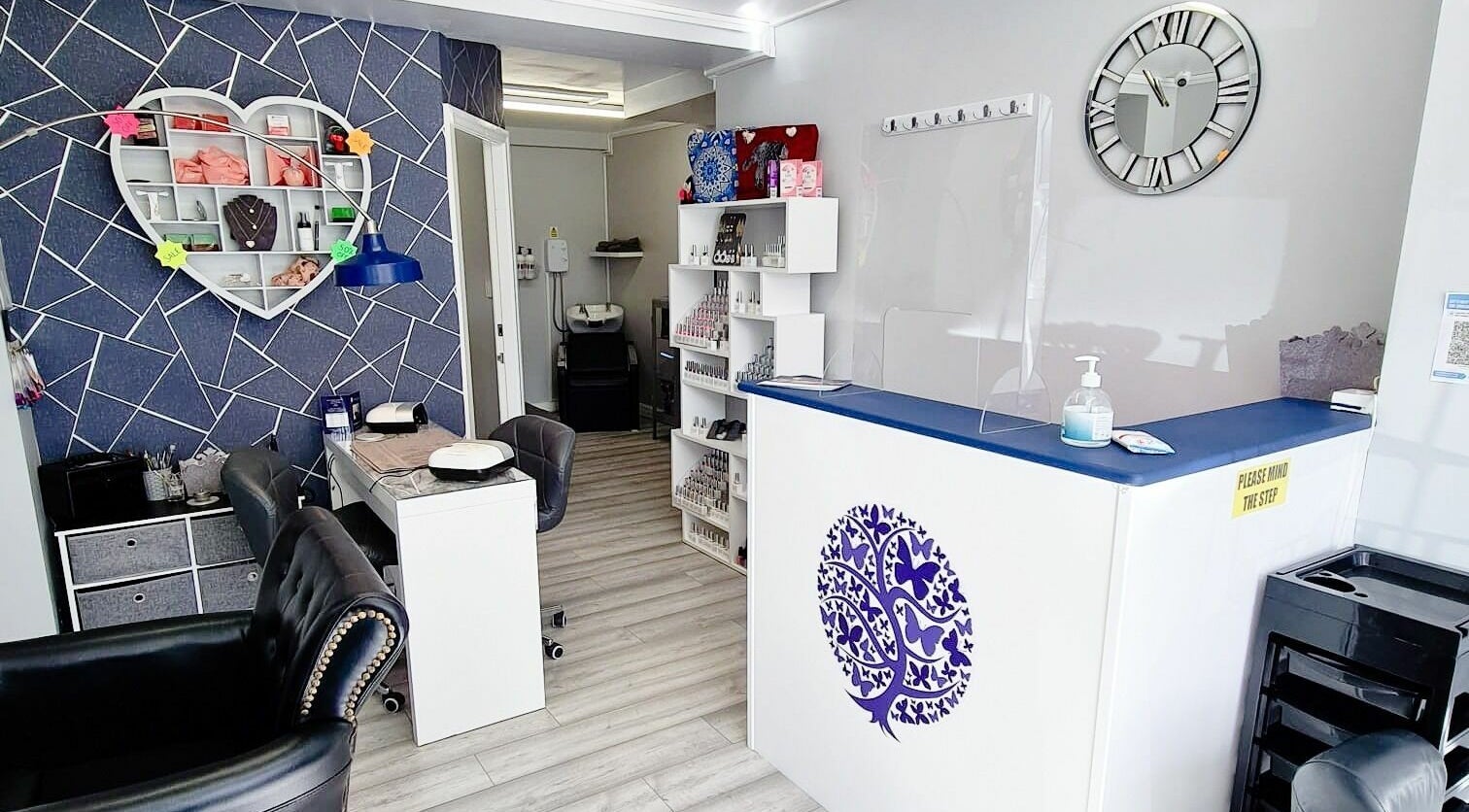 Stylish interior of Butterfly Beauty by Steph and Co., Ashton-in-Makerfield, England, GB with chic furniture.