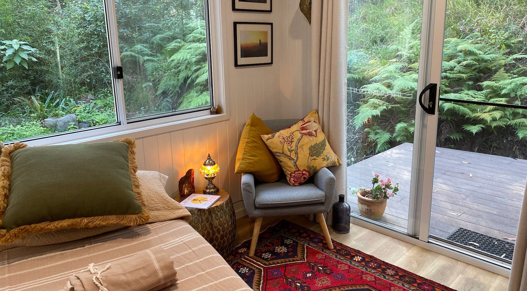 Tranquil room at Amaroo Wellness in Landers Shoot, Queensland, AU with lush garden view.