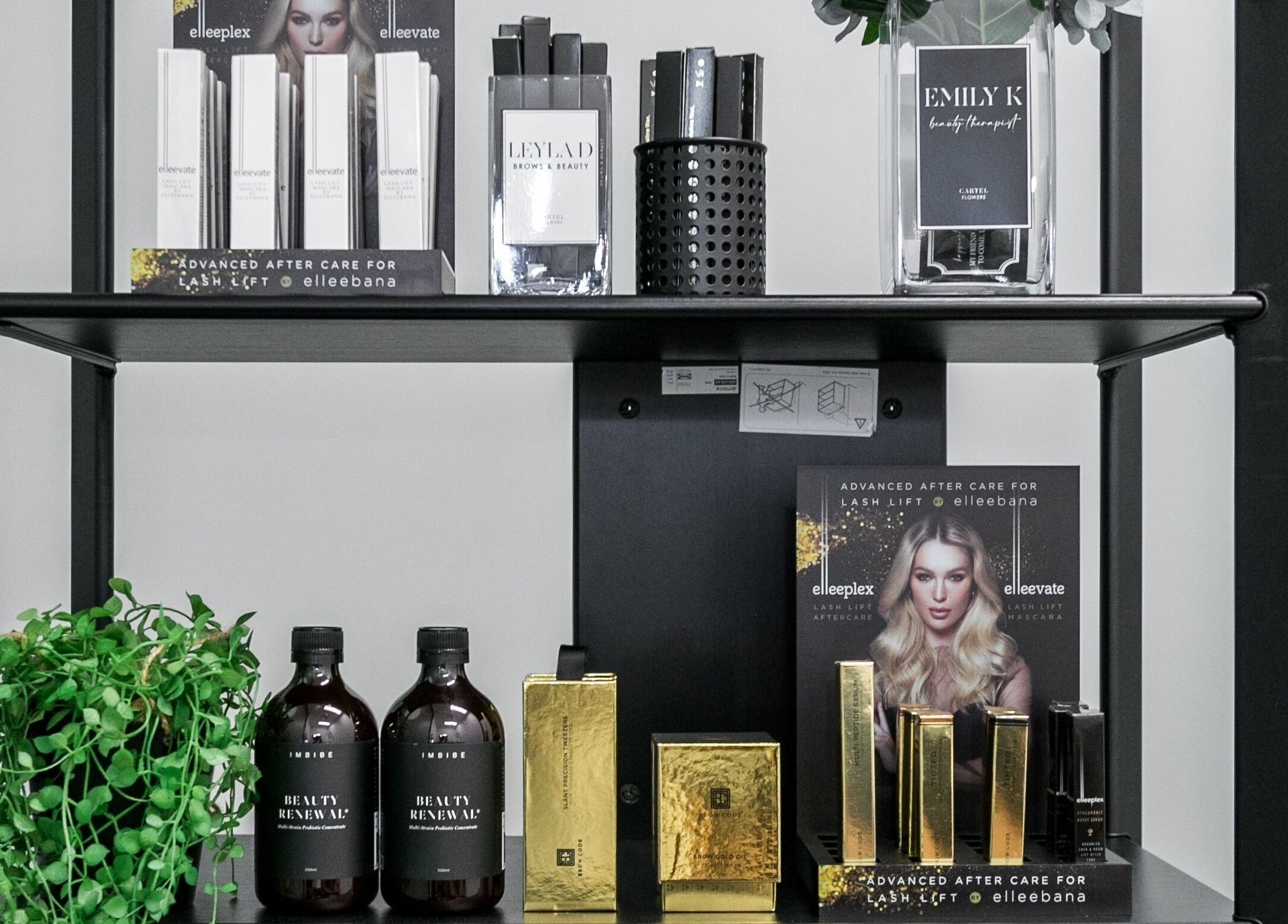 Product display shelf at Leyla D Skin Body Brows, Werribee, Victoria, AU featuring skincare and beauty items.