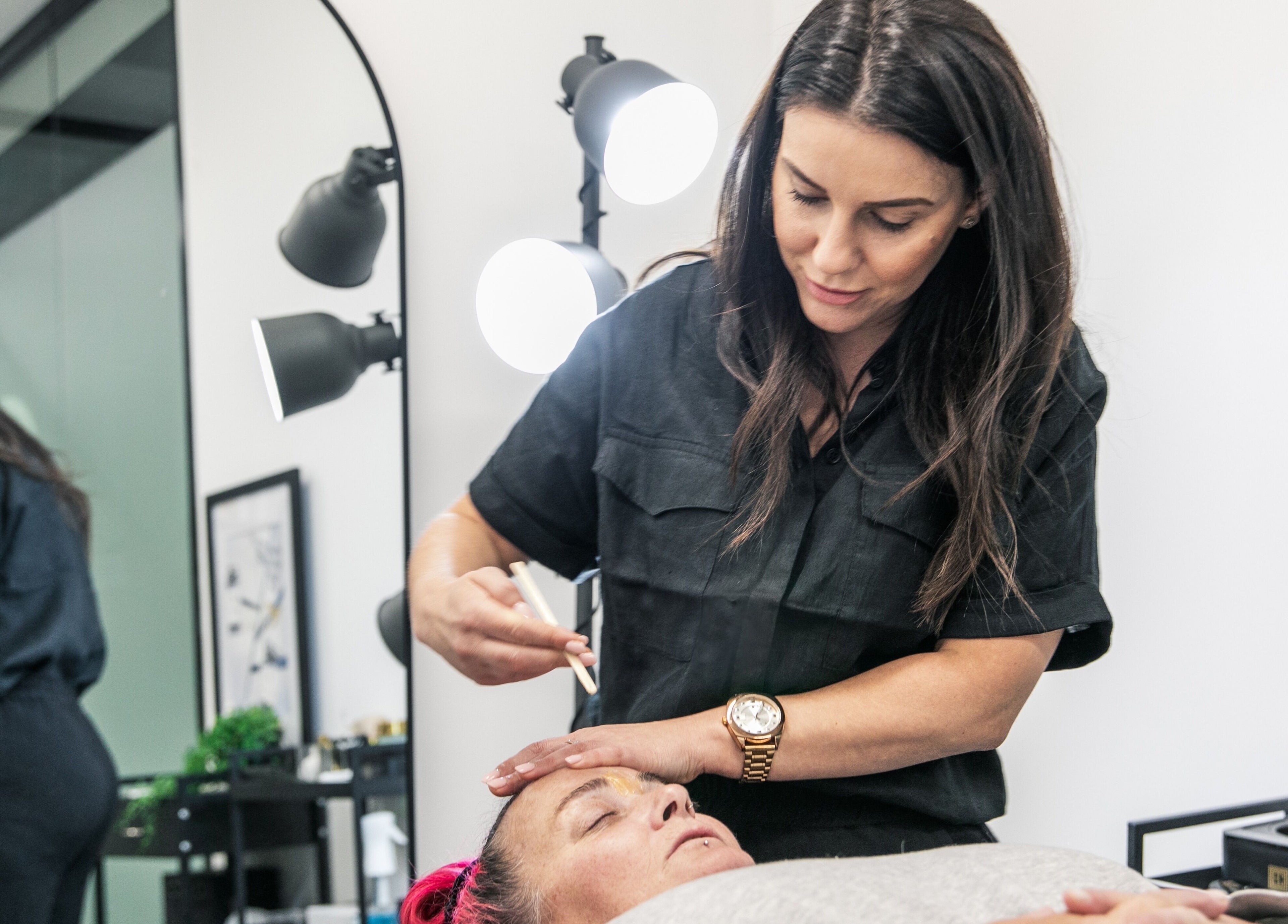Skilled esthetician at Leyla D Skin Body Brows, Werribee, Victoria, AU, performing a facial treatment.