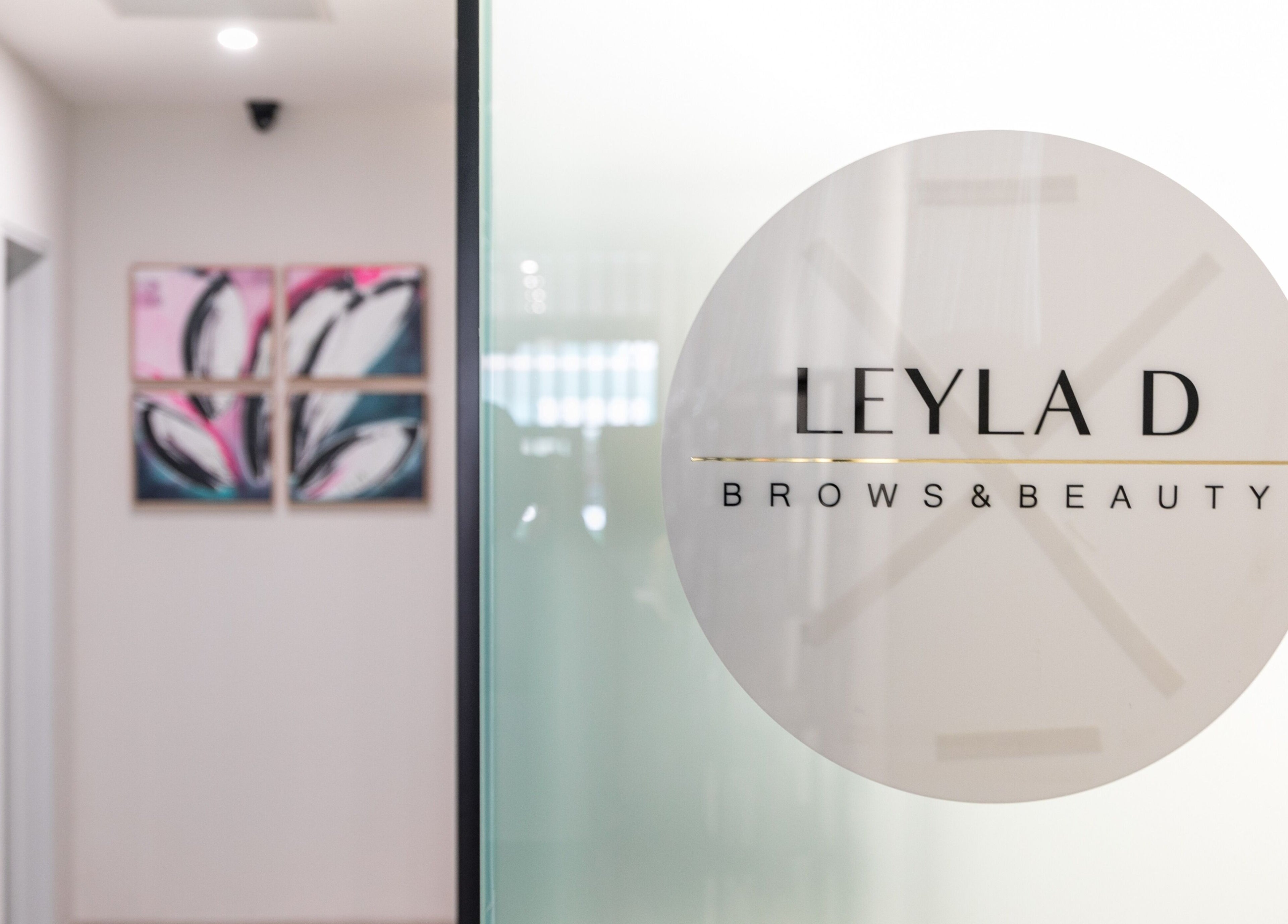 Entrance to Leyla D Skin Body Brows in Werribee, Victoria, AU featuring stylish signage and artwork.
