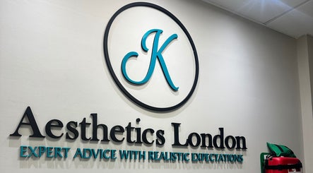 Modern logo of JK Aesthetics London on wall at their venue in London, England, GB.