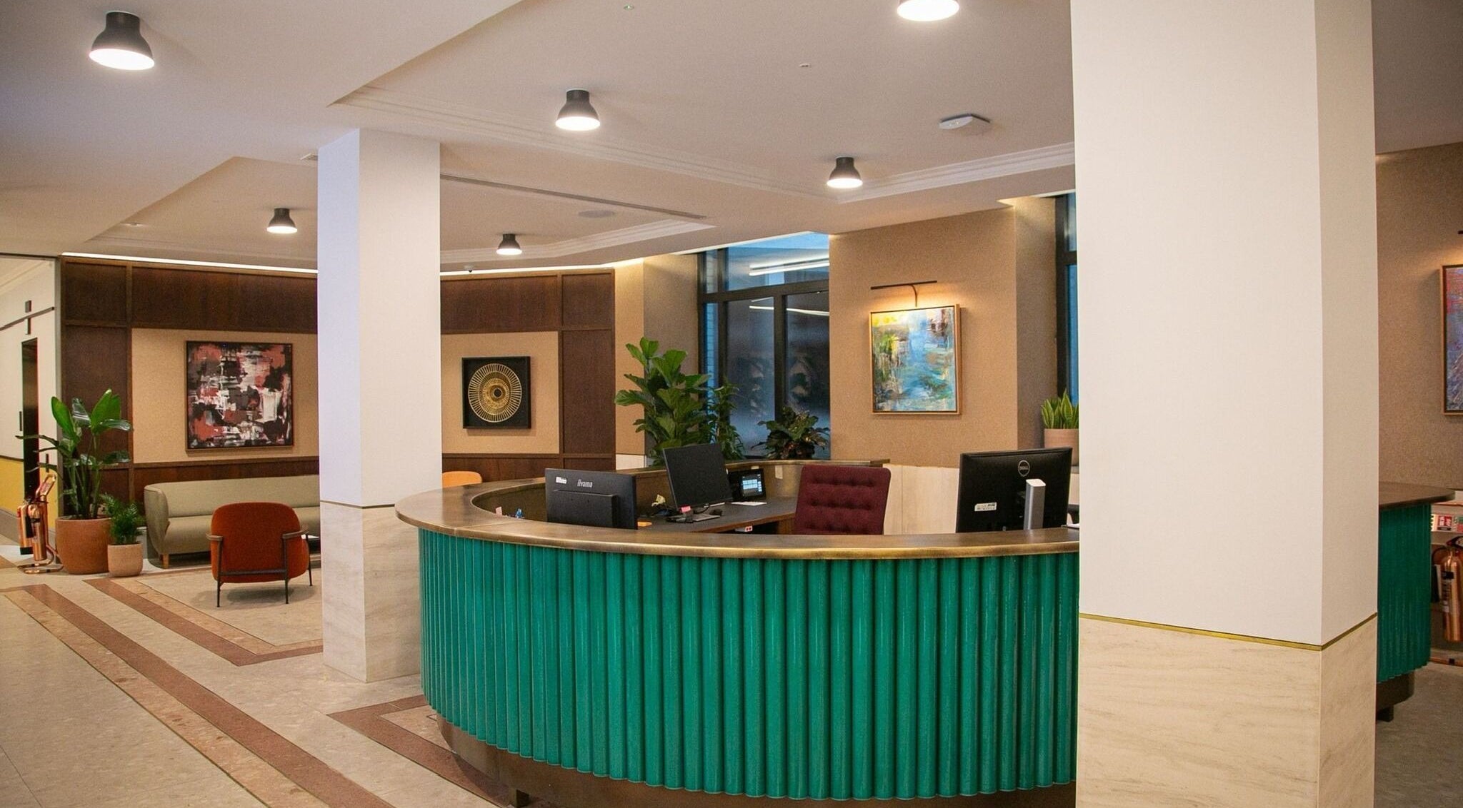 Modern reception area at JK Aesthetics London, located in London, England, GB, featuring stylish decor.