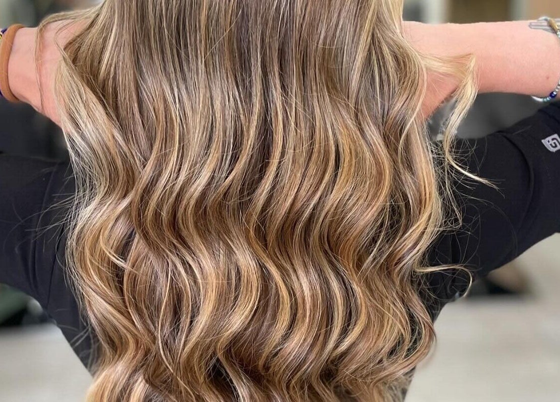 Elegant wavy blonde hair styled at Image Reflections, Johannesburg, Gauteng, ZA.