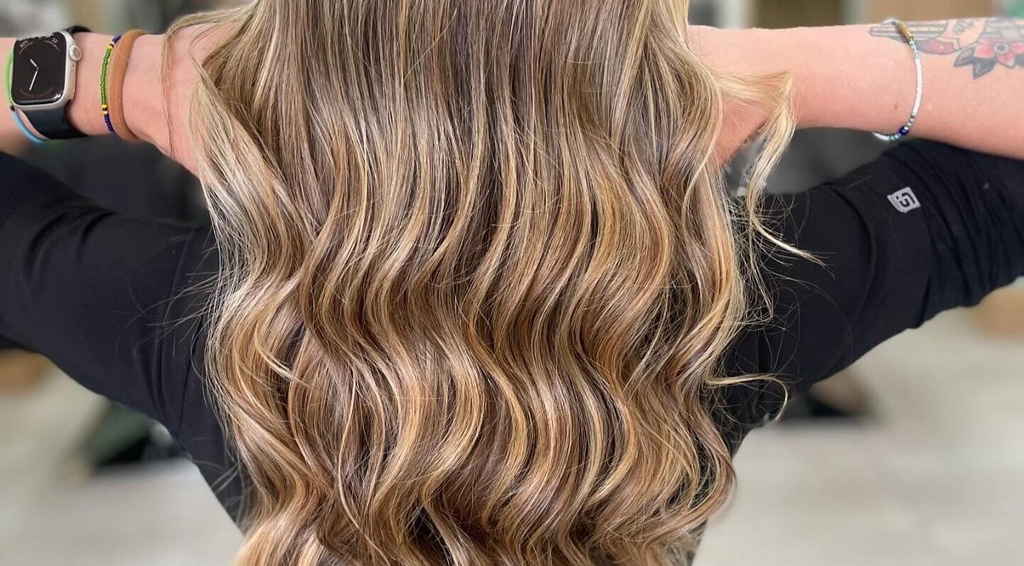 Elegant wavy blonde hair styled at Image Reflections, Johannesburg, Gauteng, ZA.