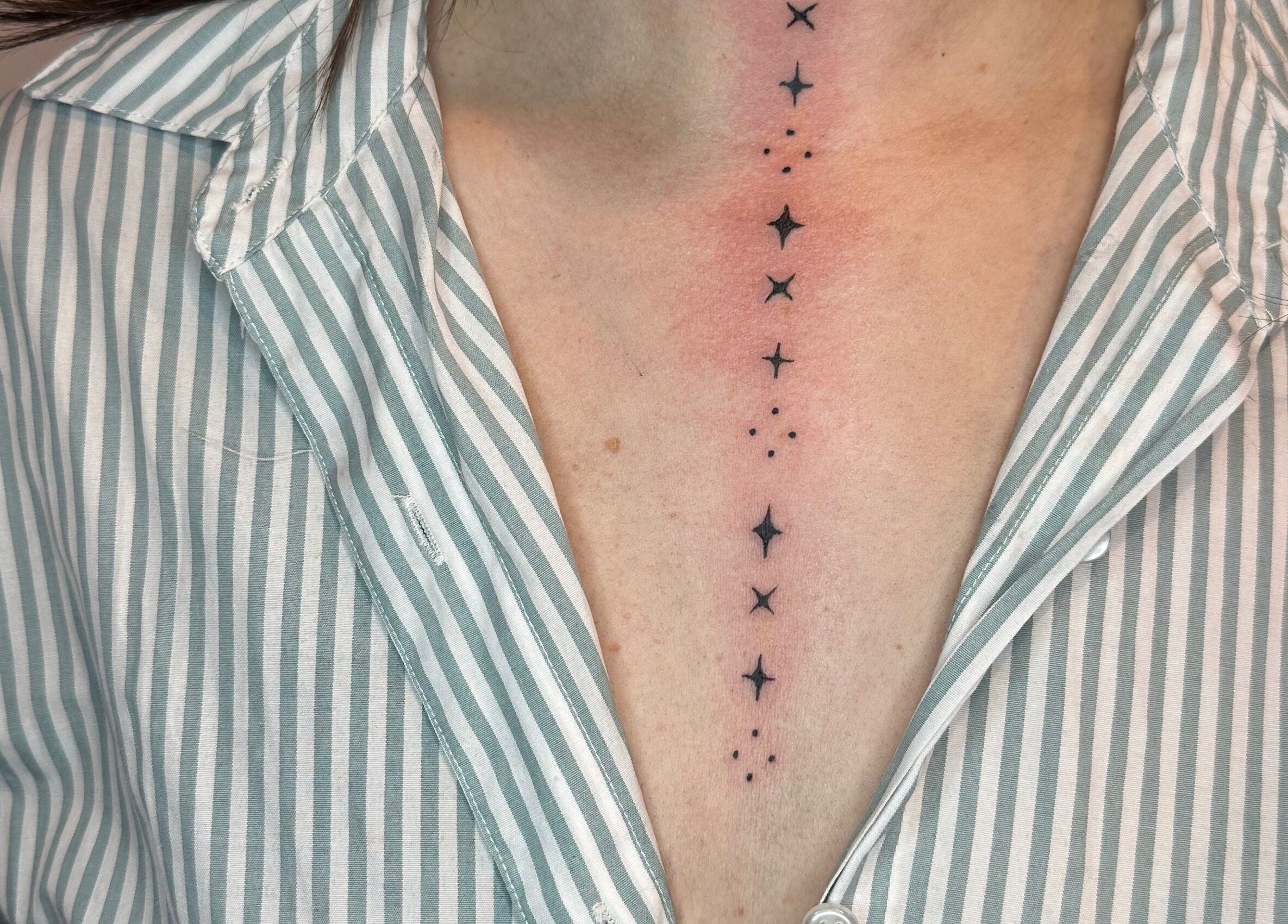 Intricate chest tattoo of stars and dots at Made&Marked by AmyLouise, Whangarei, Northland, NZ.