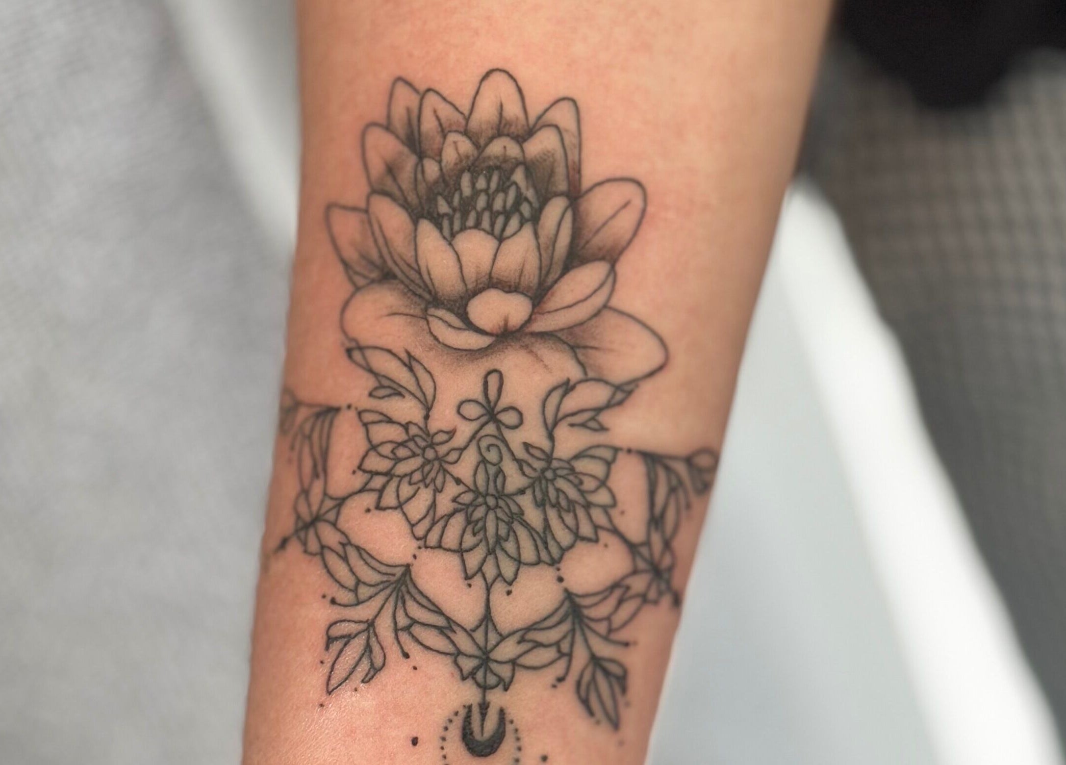 Intricate floral tattoo from Made&Marked by AmyLouise in Whangarei, Northland, NZ showcases detailed petal design.