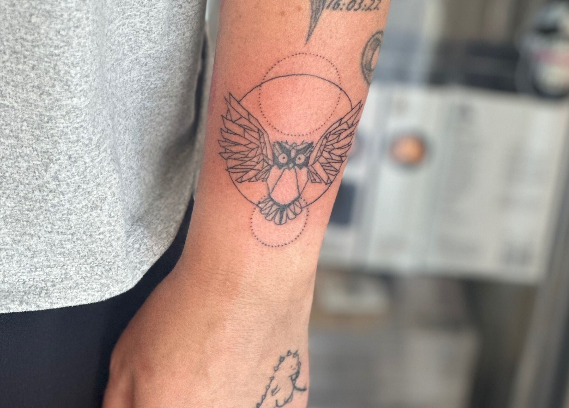 Geometric owl tattoo design showcased at Made&Marked by AmyLouise, Whangarei, Northland, NZ.