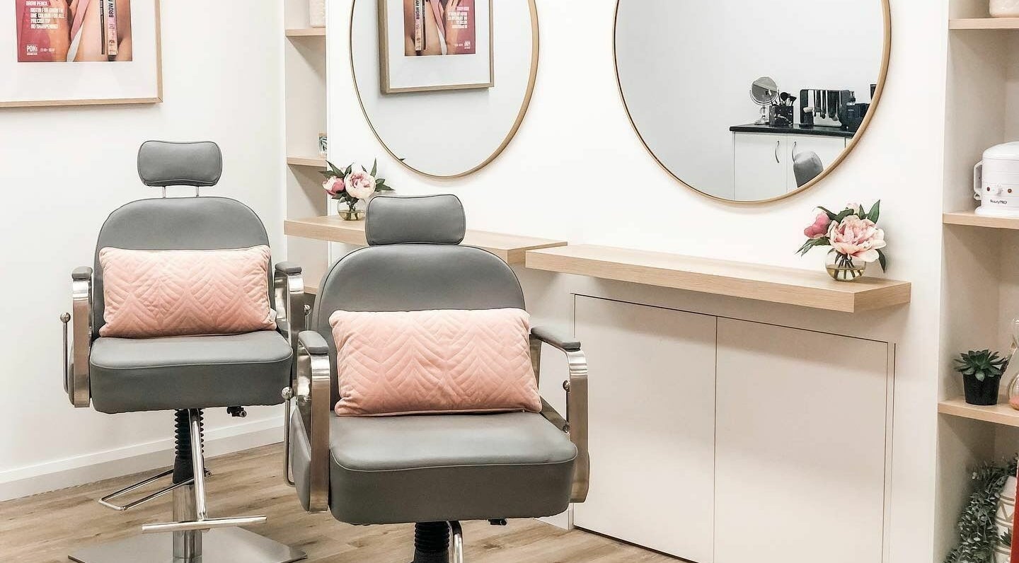 Chic salon chairs and mirrors at Retreat To Beauty, Penrith, New South Wales, AU, creating a luxurious ambiance.