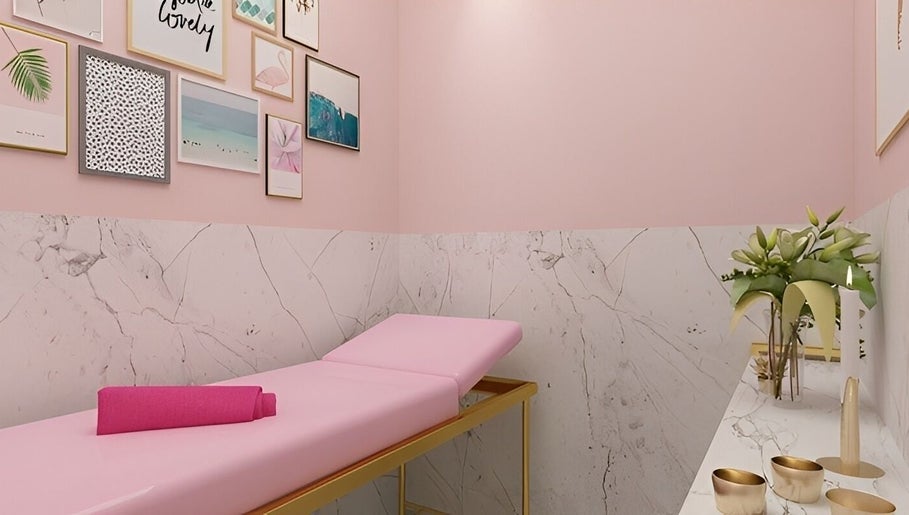 Relaxing treatment room at Pink Parlour Plaza Indonesia, Daerah Khusus Ibukota Jakarta, ID with pink decor.