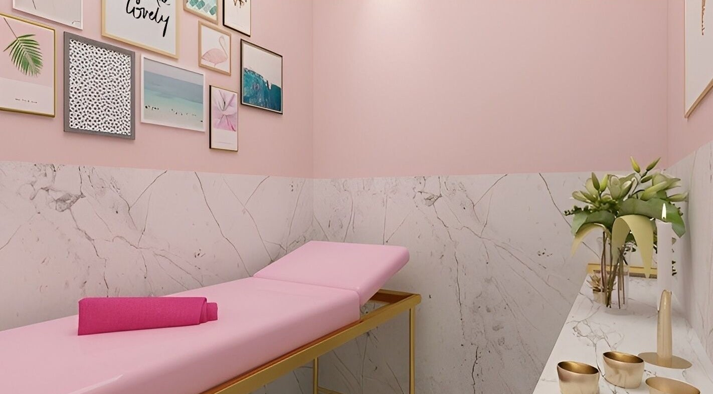 Relaxing treatment room at Pink Parlour Plaza Indonesia, Daerah Khusus Ibukota Jakarta, ID with pink decor.
