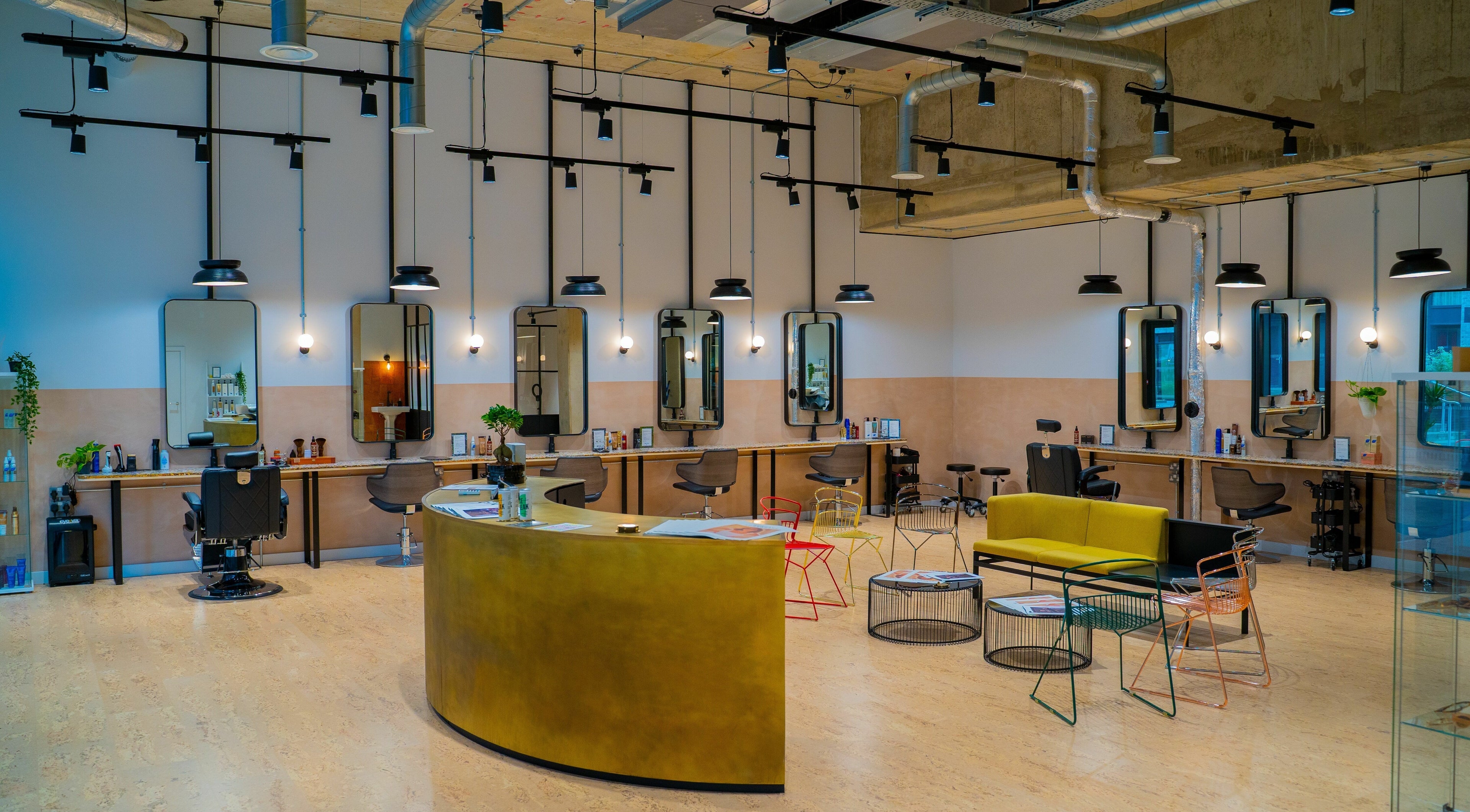 Modern salon interior at Chop Chop London Wembley Park, Park, London, England, GB with stylish workstations.