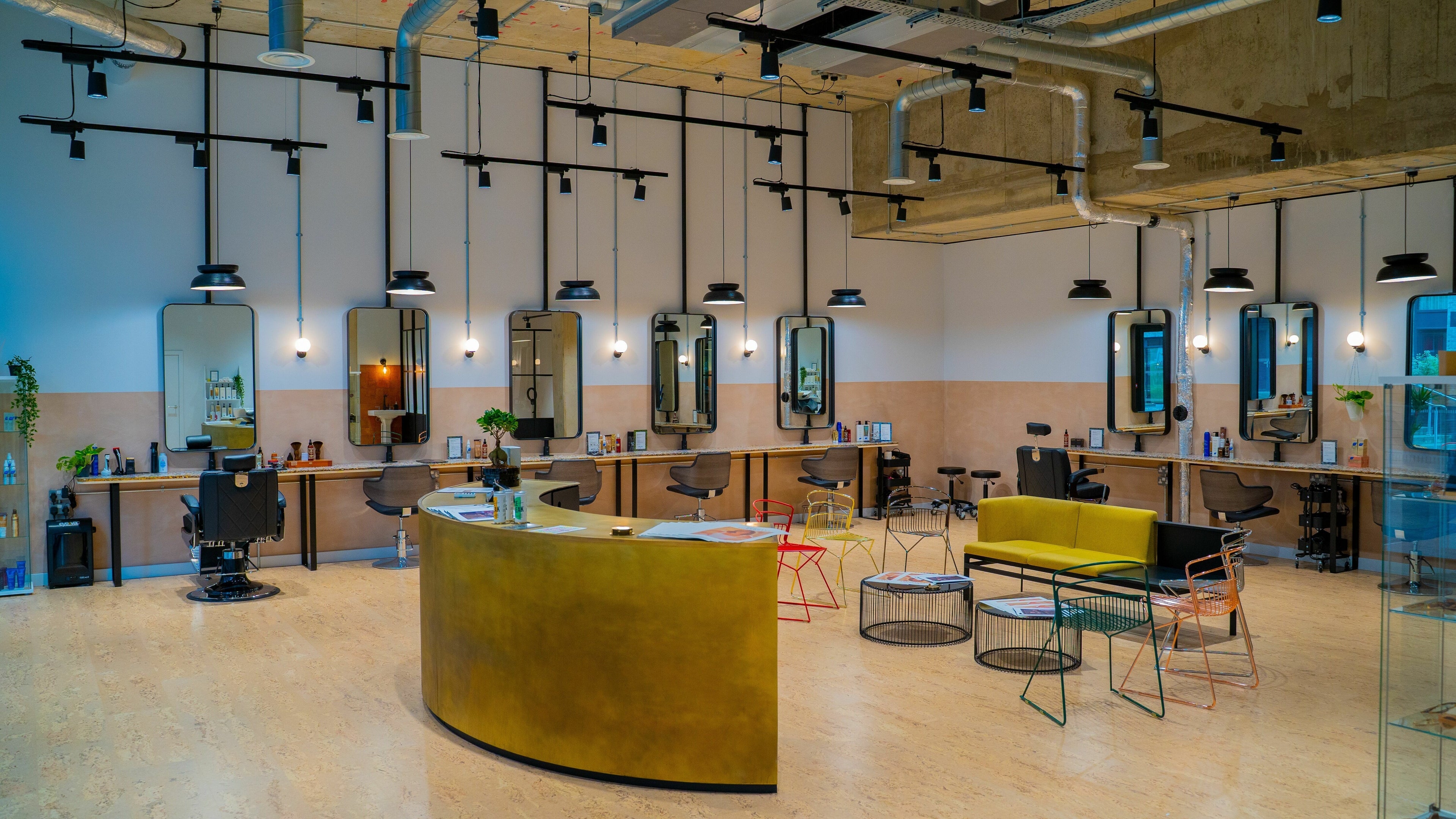 Modern salon interior at Chop Chop London Wembley Park, Park, London, England, GB with stylish workstations.