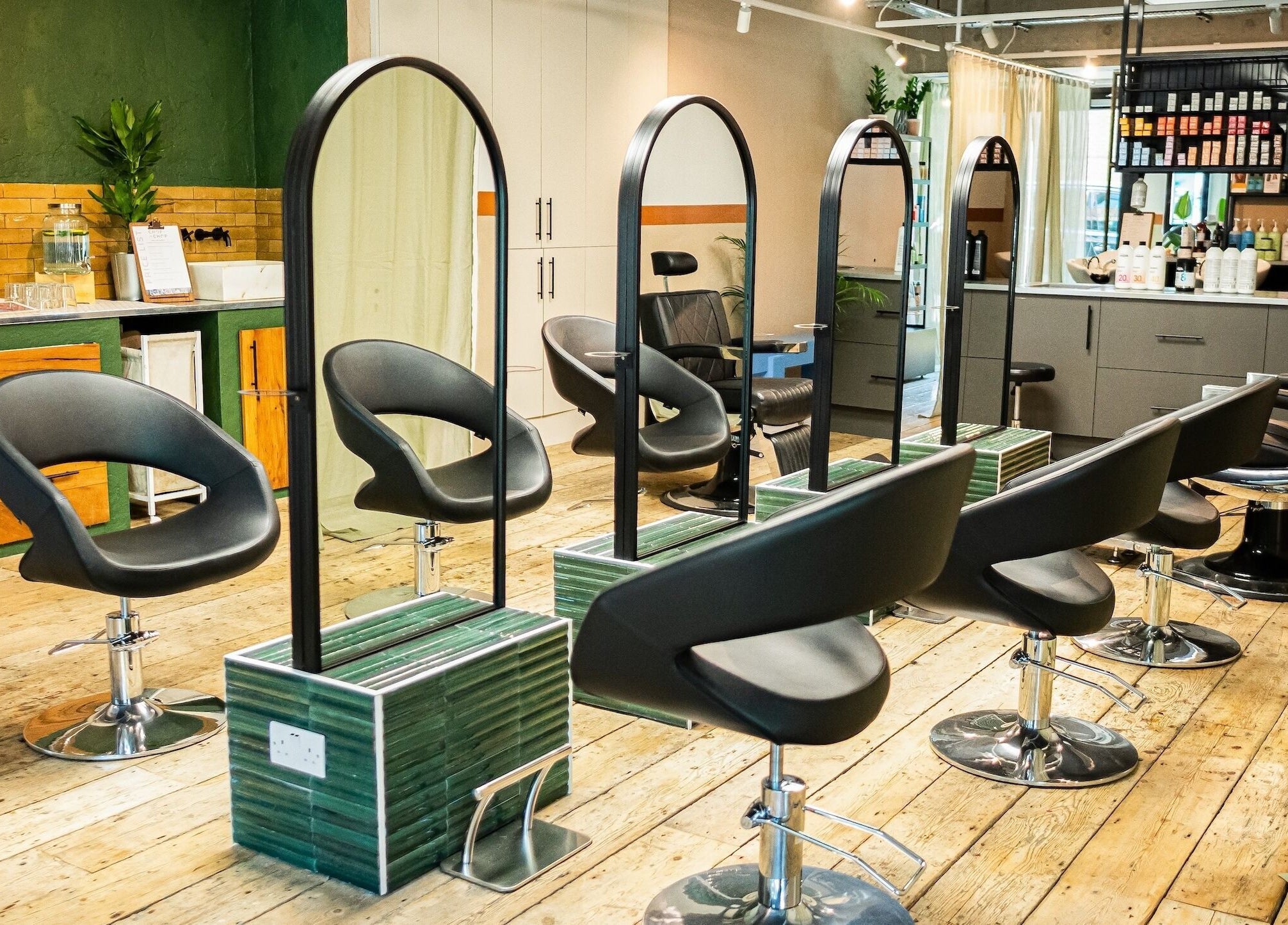 Elegant interior of Chop Chop London Camden in London, England, GB, showcasing stylish salon chairs and decor.