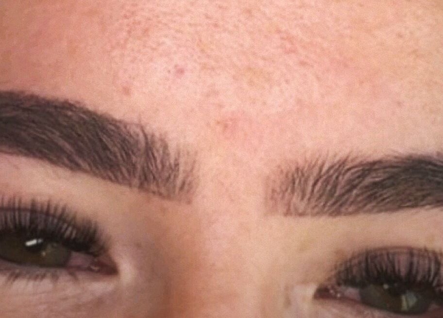 Close-up of expertly shaped eyebrows and lashes at Lucisbeautyroom in Redlodge, England, GB.