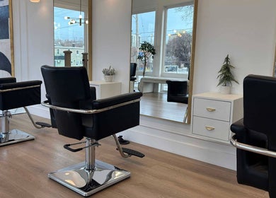 Modern salon chairs at Hair By Dawn, Jabbany Hair Salon, Ottawa, Ontario, CA, reflecting elegant style.