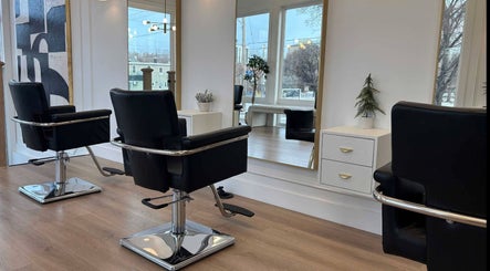 Modern salon chairs at Hair By Dawn, Jabbany Hair Salon, Ottawa, Ontario, CA, reflecting elegant style.