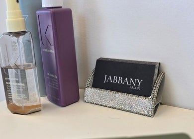 Hair products and Jabbany Hair Salon card holder at Hair By Dawn, Ottawa, Ontario, CA.