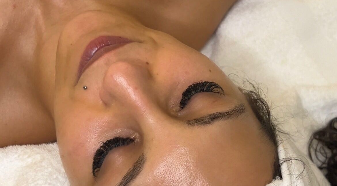 Client enjoys a serene facial treatment at Studio Beauté Deluxe in Montréal, Québec, CA.