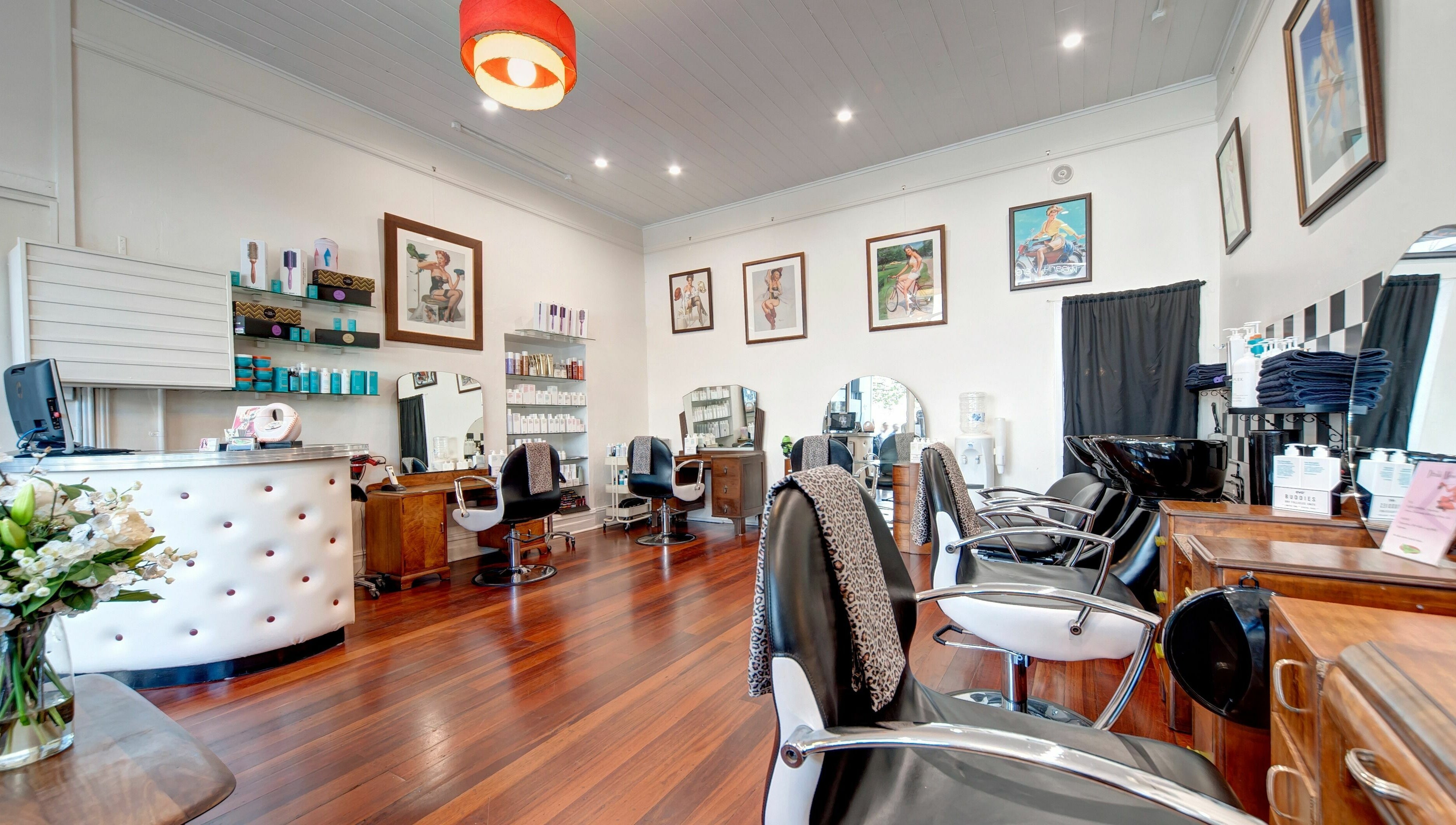 Interior of Doowop Hair salon in Fremantle, Western Australia, AU. Elegant chairs and decor showcase the modern vibe.