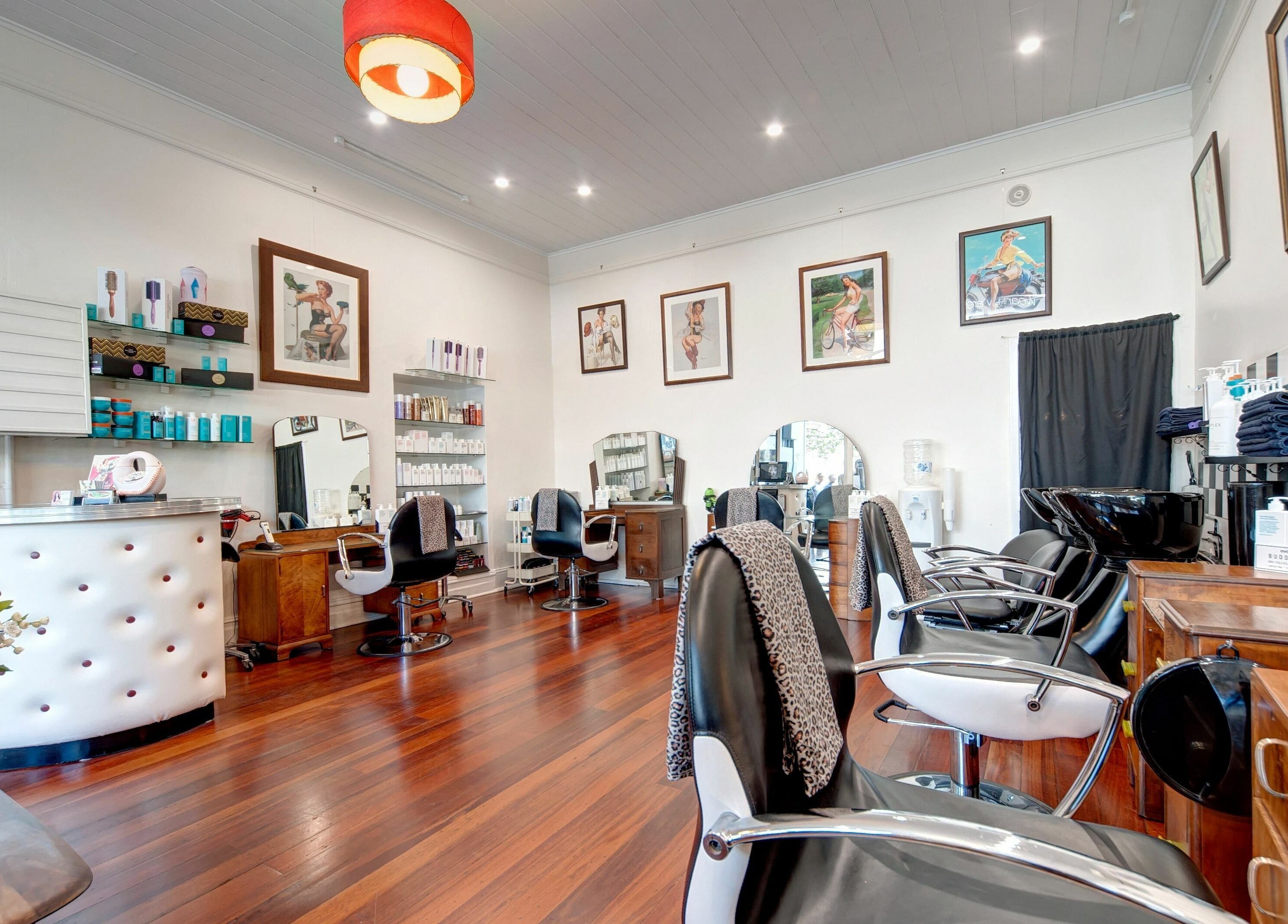 Interior of Doowop Hair salon in Fremantle, Western Australia, AU. Elegant chairs and decor showcase the modern vibe.