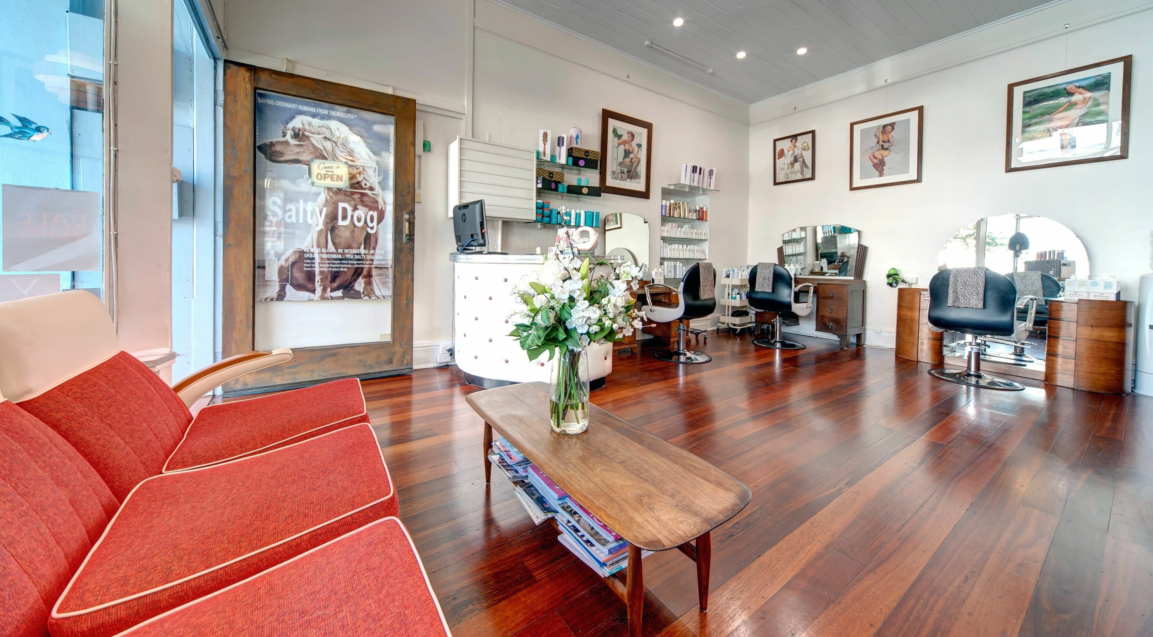 Stylish interior of Doowop Hair in Fremantle, Western Australia, AU with modern seating and decor.
