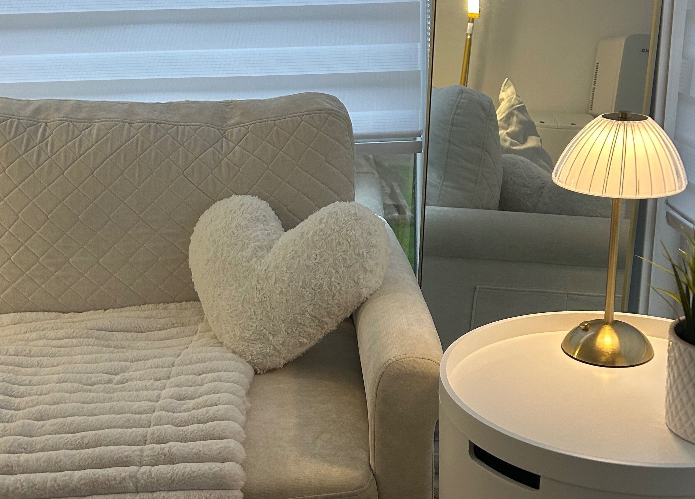 Cozy seating area with plush decor at Laura Dix Mentoring, Ebbw Vale, Wales, GB.