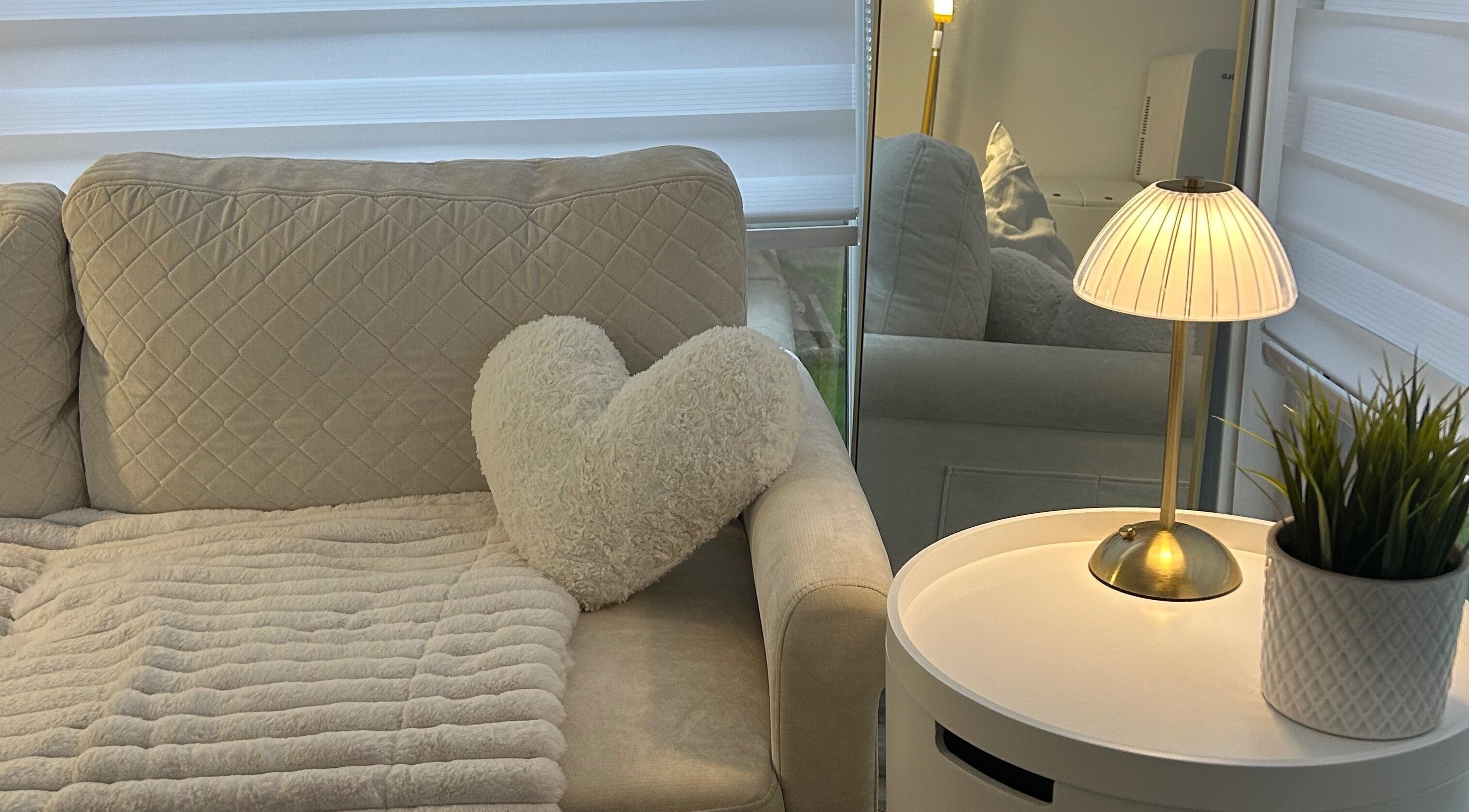 Cozy seating area with plush decor at Laura Dix Mentoring, Ebbw Vale, Wales, GB.