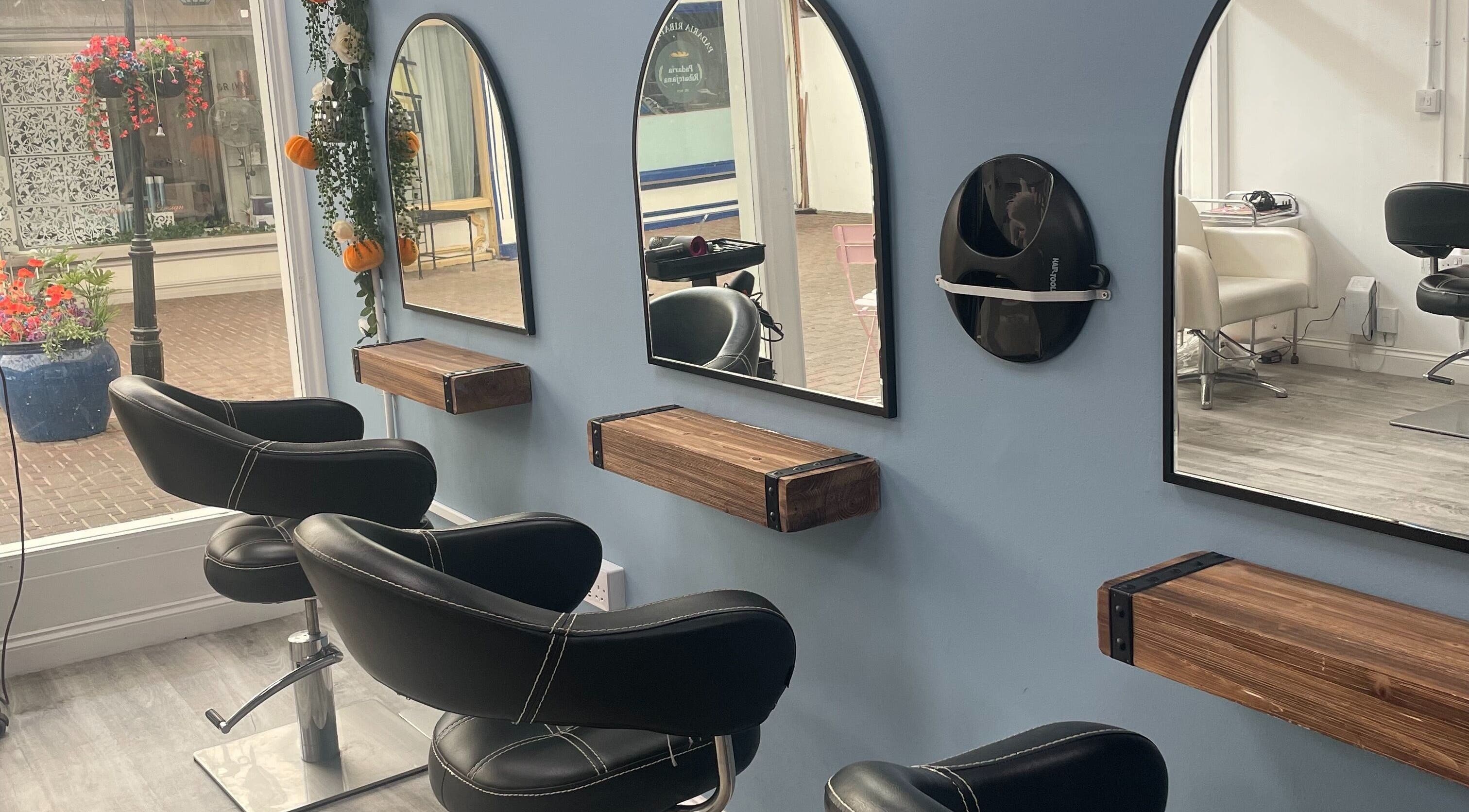 Cozy seating and mirrors at Hive Hair Lounge, Saint Helier, St Helier, JE.