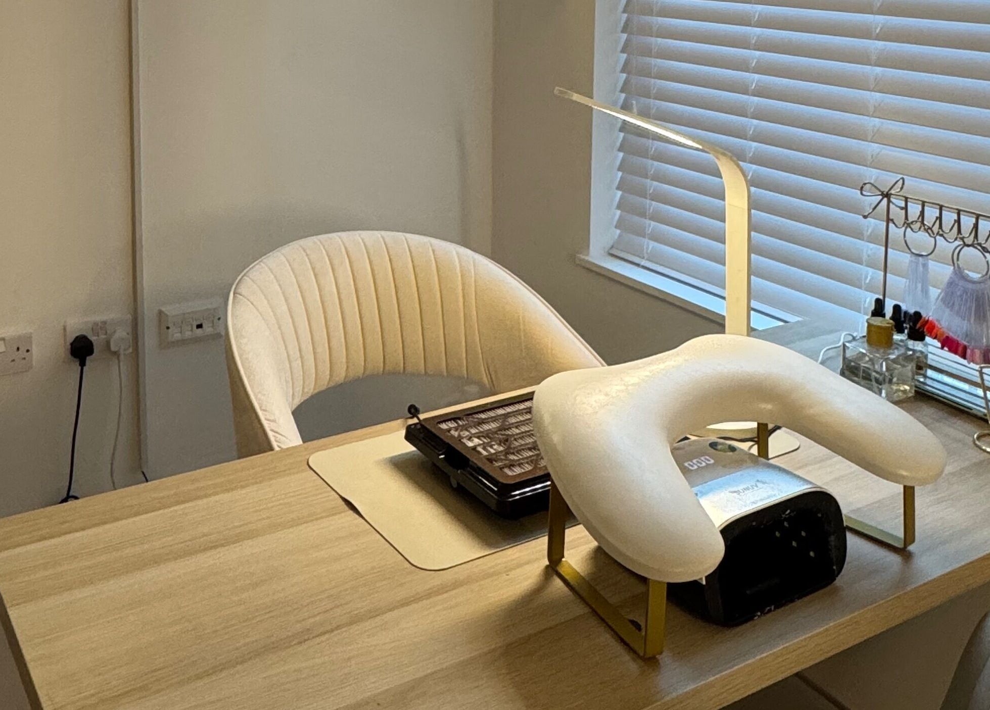 A stylish nail station at Glam by Beth, Bolton, England, GB, showcasing a chic, well-equipped setup.