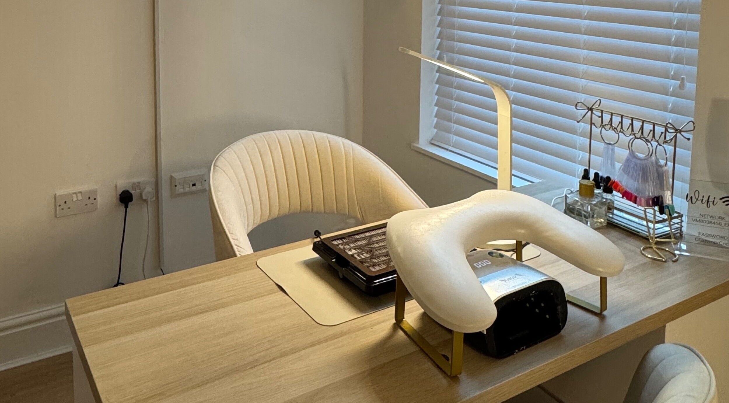 A stylish nail station at Glam by Beth, Bolton, England, GB, showcasing a chic, well-equipped setup.