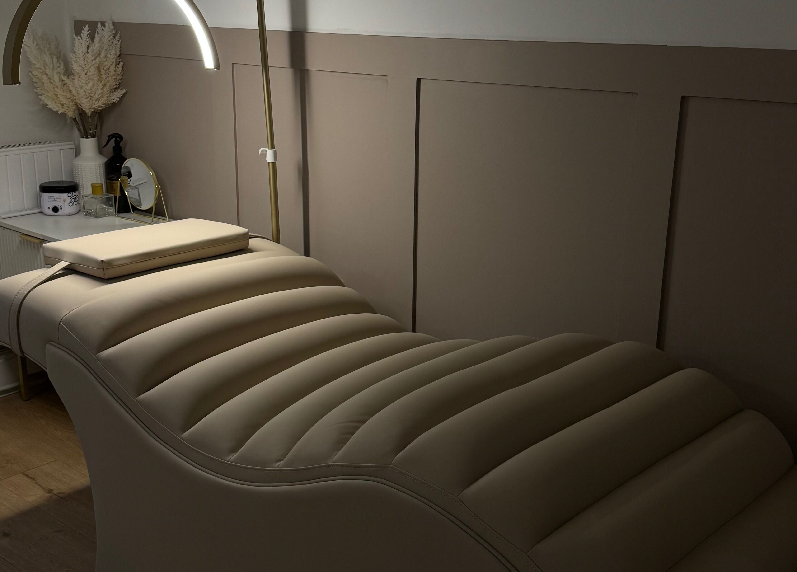 Luxurious treatment bed at Glam by Beth, Bolton, England, GB, offering a tranquil beauty experience.